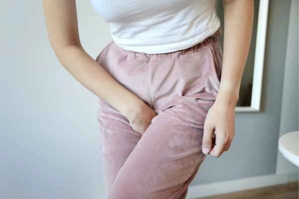 older woman running to the toilet because of urinary incontinence King's Heath